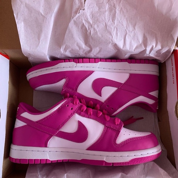 Nike Pink and White Sneakers / selling for a new pair.